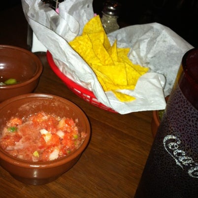 Photo taken at La Familia Mexican Restaurant by Rooster B. on 8/12/2012