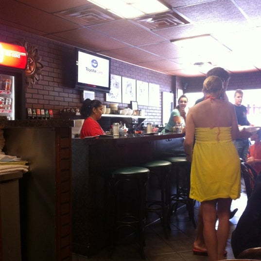 Foto tirada no(a) Brittany Cafe por Dean P. em 8/26/2012