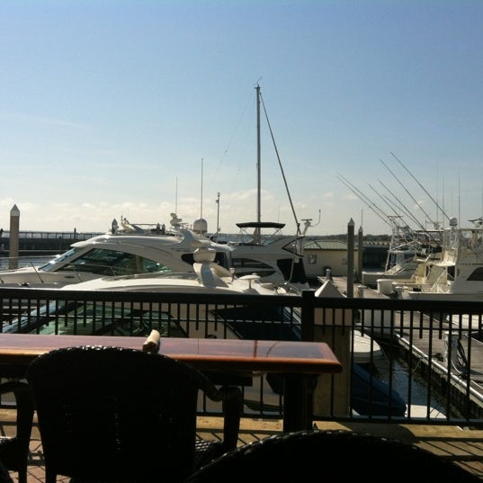 Photo taken at Jaco&#39;s Bayfront Bar &amp; Grille by Erica C. on 3/18/2012