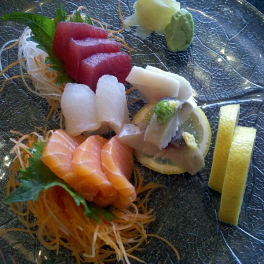 Photo taken at Yoshi Sushi by Marina V. on 12/3/2011