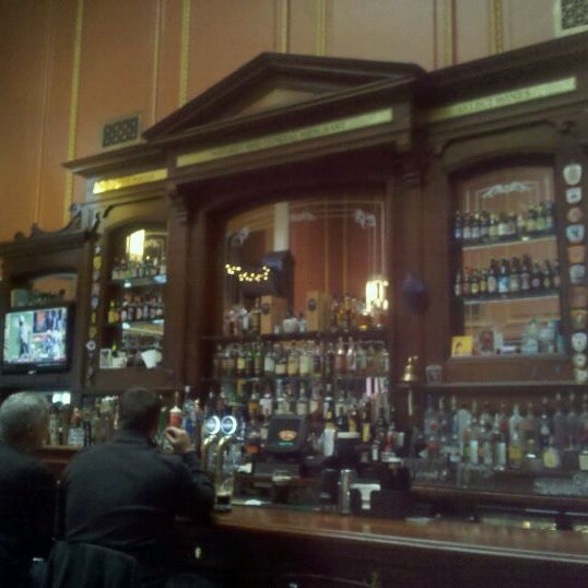 Photo taken at Ri Ra Irish Pub and Restaurant by Sarah W. on 12/30/2011