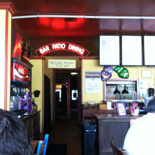 Photo taken at VooDoo BBQ &amp; Grill Uptown by Blake W. on 2/29/2012