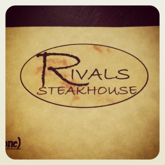 Photo taken at Rivals Steak House by Ashley G. on 5/23/2012
