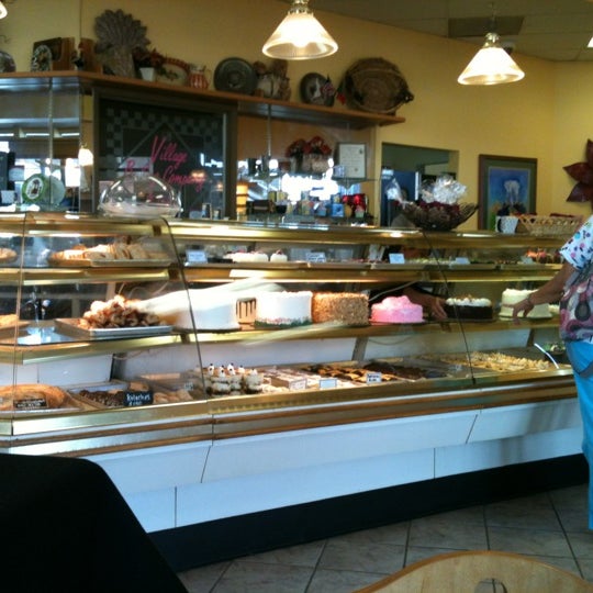 Photo taken at Village Baking Company &amp; Cafe by Genevieve L. on 3/30/2012