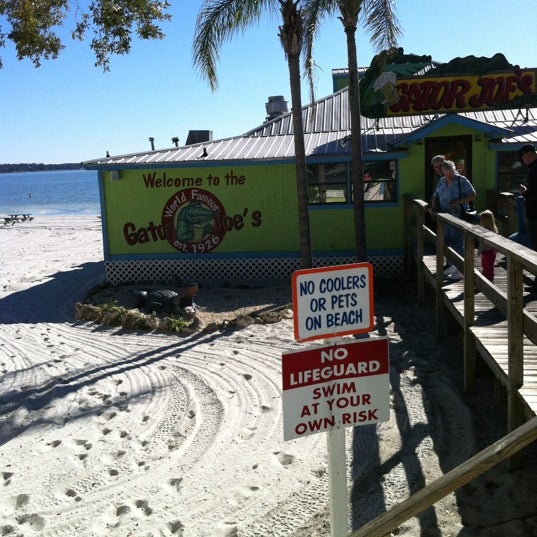 Photo taken at Gator Joe&#39;s Beach Bar &amp; Grill by Mike S. on 1/19/2012