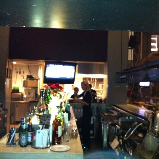Photo taken at Kora Restaurant &amp; Bar by Fred S. on 12/4/2011