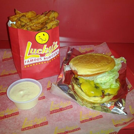 Photo taken at Lucky&#39;s Famous Burgers by Gabriel R. on 2/27/2012