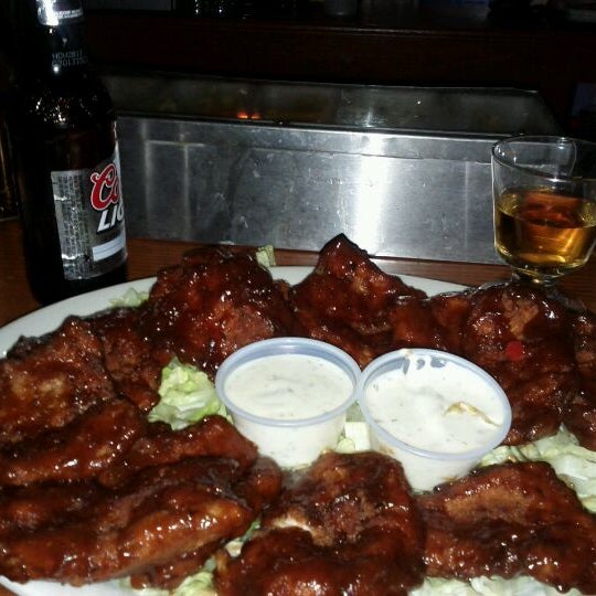 Photo taken at LoneStar Bar &amp; Grill by Makis on 9/18/2011
