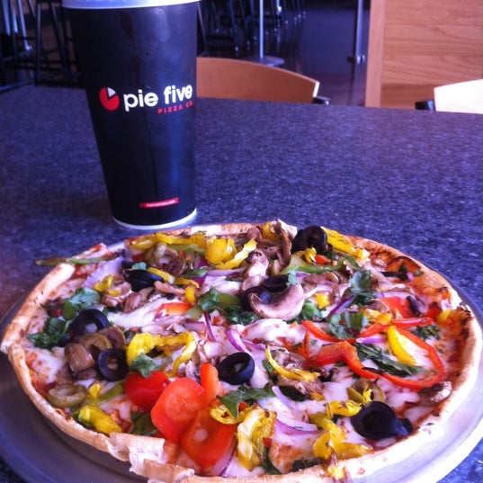 Photo taken at Pie Five Pizza by Ty L. on 7/19/2012