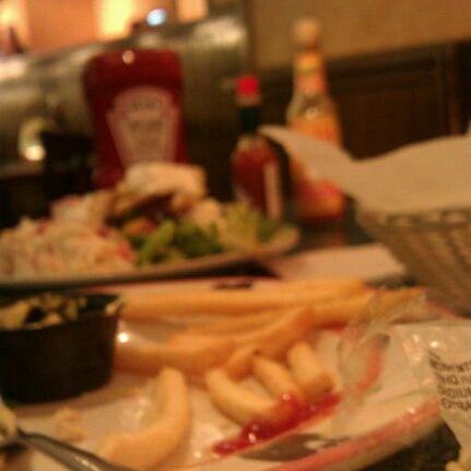 Photo taken at Sizzler by Nette A. on 12/14/2011