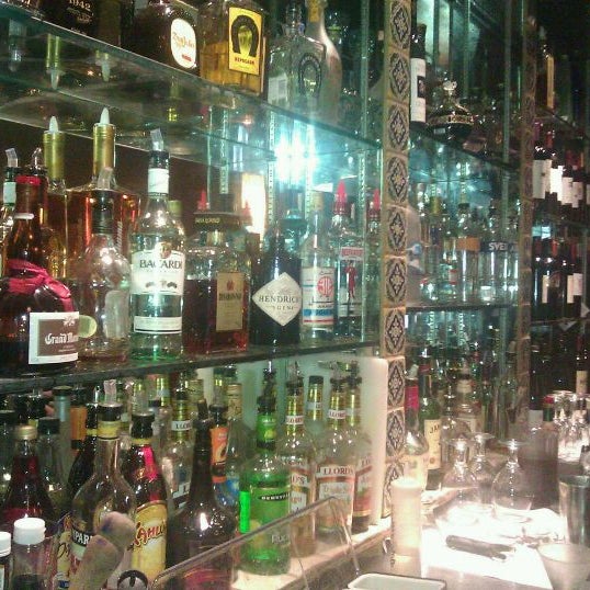 Foto diambil di Basil&#39;s Restaurant &amp; Tapas Bar oleh Carla D. pada 8/31/2011