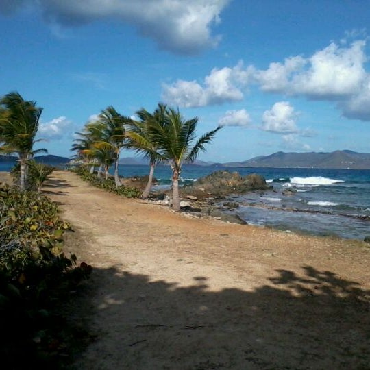 Photo taken at Sapphire Beach by Rick M. on 3/16/2012