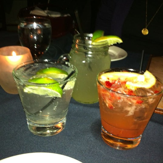 Photo taken at The Brahmin American Cuisine and Cocktails by Tanya G. on 2/17/2012