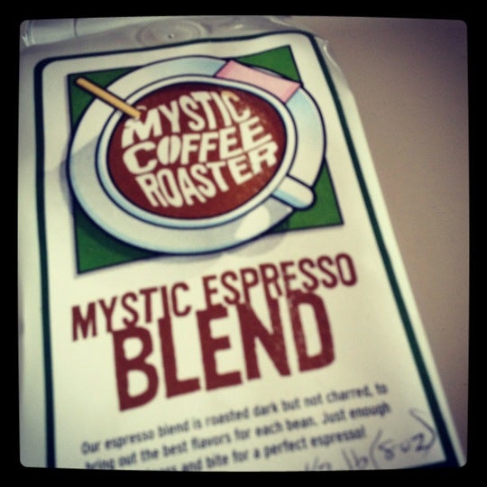 Photo taken at Mystic Coffee Roaster by Andrew H. on 11/27/2011