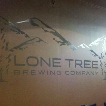 Photo taken at Lone Tree Brewery Co. by Nicole O. on 12/17/2011