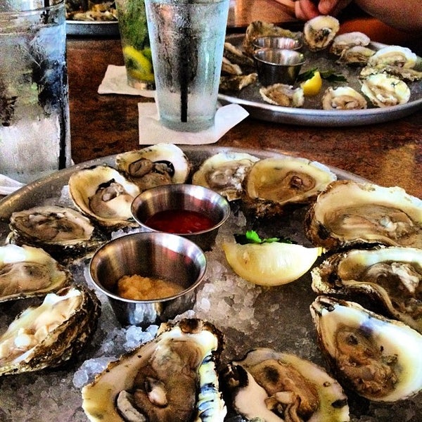 Photo taken at Mahi Mah&#39;s Seafood Restaurant by katrina j. on 8/22/2012