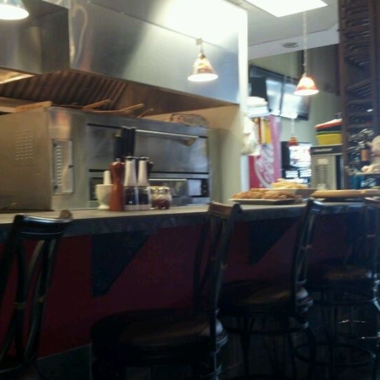 Photo taken at Bada Bing Pizzeria &amp; Italian Cuisine by Michael R. on 2/5/2012