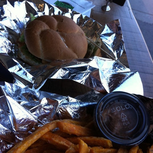 Photo taken at Burger Stomper Gourmet Burger &amp; Milkshake Bar by Connie C. on 4/11/2012