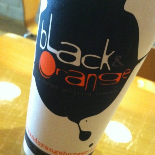 Photo taken at Black &amp; Orange by Theodore D. on 3/20/2012