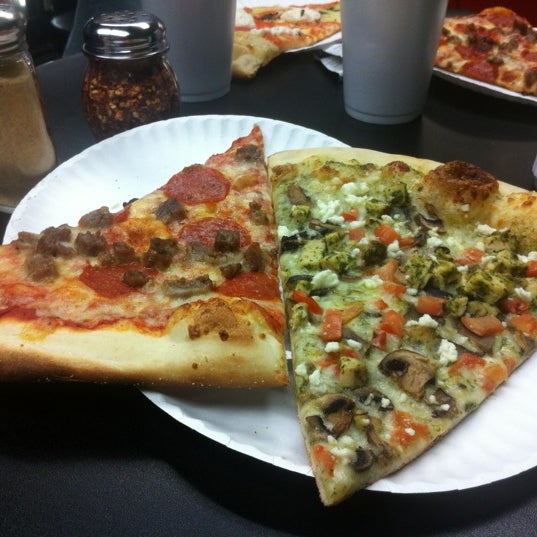 Photo taken at Slices Pizza by Samuel O. on 6/21/2012