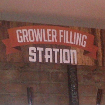 Photo taken at Growler Station by Jeffrey on 6/4/2012