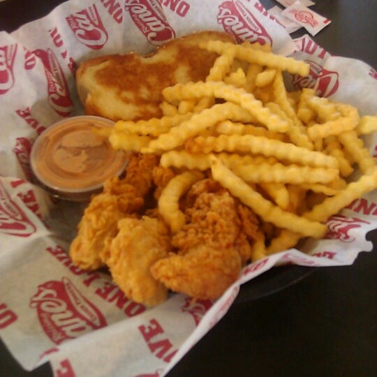 Photo taken at Raising Cane&#39;s Chicken Fingers by J M. on 7/18/2012