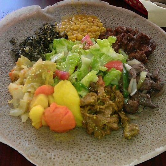 Photo taken at Enat Ethiopian by Restita D. on 7/21/2012
