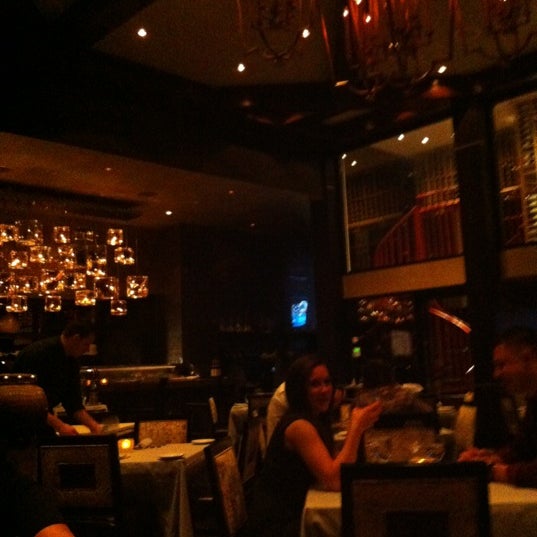 Photo taken at Insignia Prime Steak &amp; Sushi by Bee on 5/23/2012