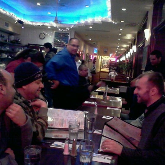 Photo taken at Gramercy Cafe by Omar C. on 1/21/2012