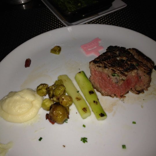 Foto diambil di BLT Steak oleh Allie G. pada 12/14/2011