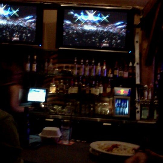 Photo taken at Karma Bar &amp; Grill by Britney W. on 7/8/2012