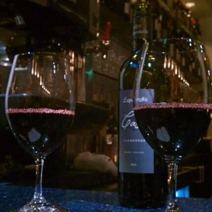 Photo taken at Carpe Diem Wine Bar by Amorette P. on 1/30/2012