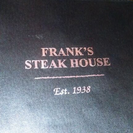 Photo taken at Frank&#39;s Steak House by Jake S. on 12/24/2011