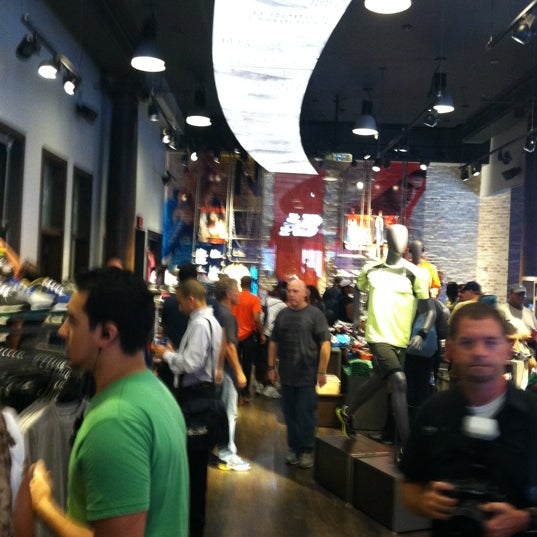 Photo taken at New Balance Flagship Store by Mike S. on 8/11/2011