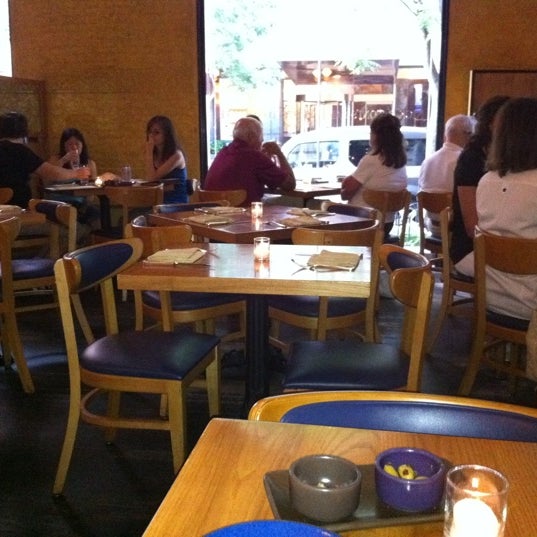 Photo taken at Nick &amp; Toni&#39;s Cafe by Tommy T. on 8/8/2011