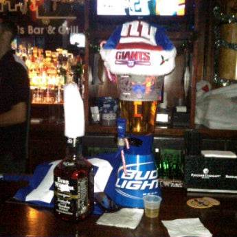 Photo taken at The Downtown Sports Bar &amp; Grill by Kevin M. on 12/23/2011