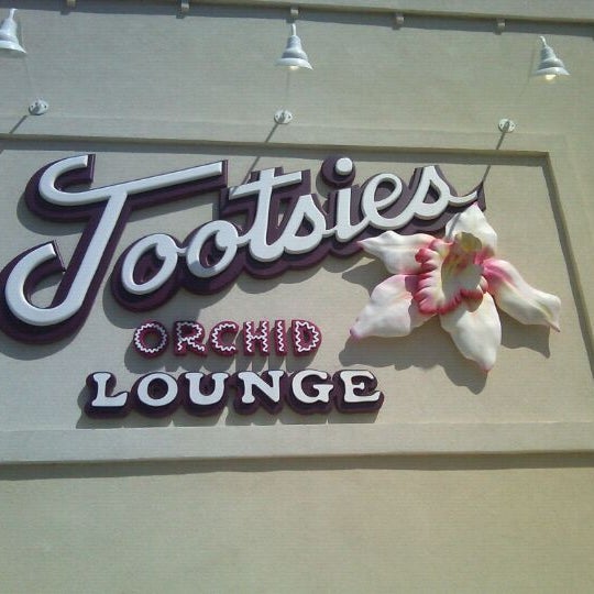 Photo taken at Tootsie&#39;s World Famous Orchid Lounge by Rebecca H. on 3/7/2012
