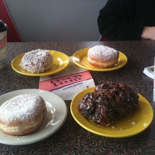 Photo taken at Donuts Delite / Salvatore&#39;s Old Fashioned Pizzeria by Kristin M. on 12/17/2011