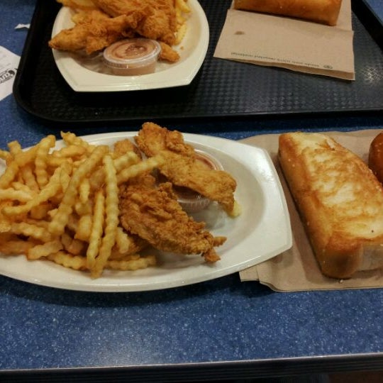 Photo taken at Raising Cane&#39;s Chicken Fingers by Mike L. on 1/21/2012