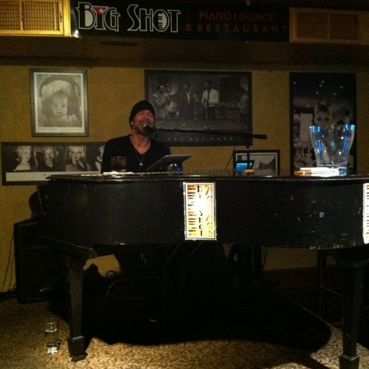Photo taken at Big Shot Piano Lounge &amp; Restaurant by Scott C. on 3/10/2012