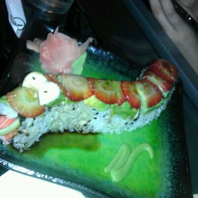 Photo taken at Dragonfly Sushi &amp; Sake Co by Julie G. on 3/18/2012