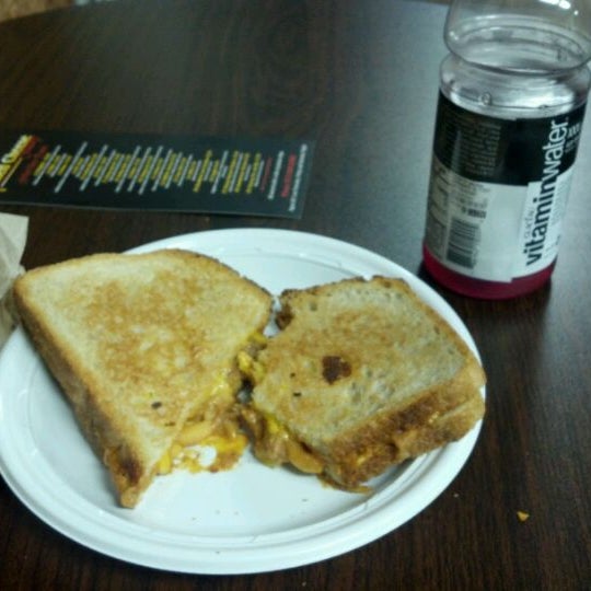 Photo taken at Grilled Cheese at the Melt Factory by Derek on 5/4/2012