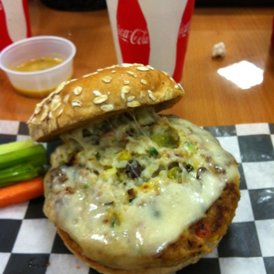 Снимок сделан в The Burger Point пользователем Maria M. 2/17/2012