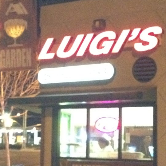 Photo taken at Luigi&#39;s Pizza Parlor by Cisco da kidd on 3/8/2012