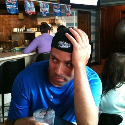 Foto diambil di Snickers Bar &amp; Grill oleh Carmelo C. pada 8/3/2012