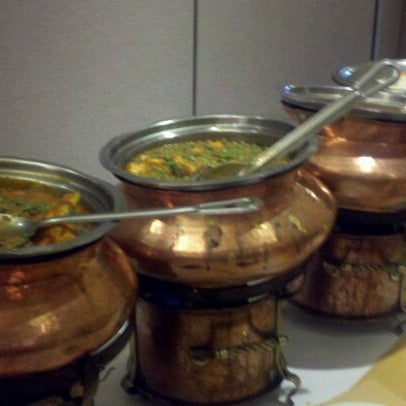 Photo taken at Akbar Indian Restaurant by Derek F. on 10/1/2011