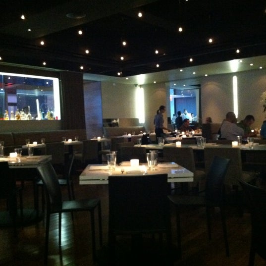 Photo taken at KTCHN Restaurant by Nicholas R. on 6/28/2012