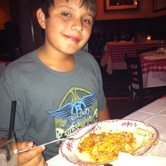 Photo taken at Maggiano&#39;s Little Italy by Rosicella J. on 7/17/2011