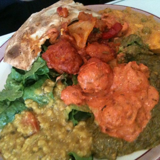 Photo taken at India Gate Restaurant by Maya O. on 4/13/2012