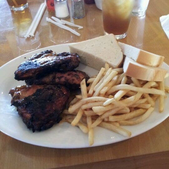 Photo taken at Jamaica Gates Caribbean Restaurant by Kimberly D. on 2/25/2012